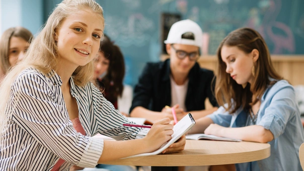 Smiling teenage student girl